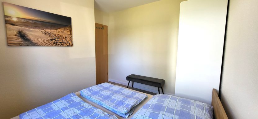 Schlafzimmer 2 im EG mit Doppelbett